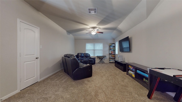 carpeted living room featuring ceiling fan