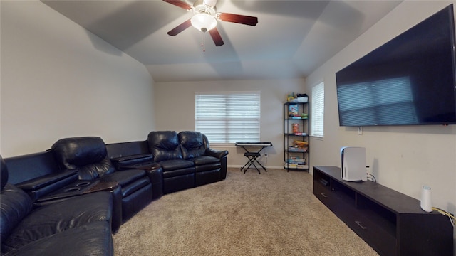 cinema with ceiling fan, carpet flooring, and vaulted ceiling