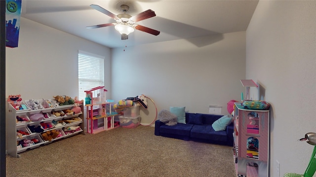 game room with carpet floors and ceiling fan