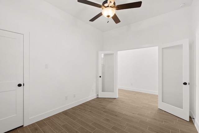 spare room featuring ceiling fan