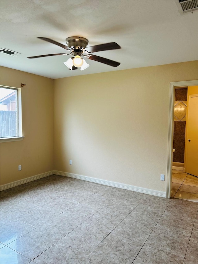 spare room with light tile patterned floors