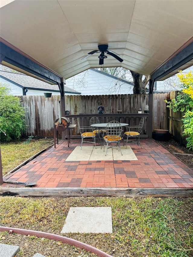 view of patio featuring ceiling fan