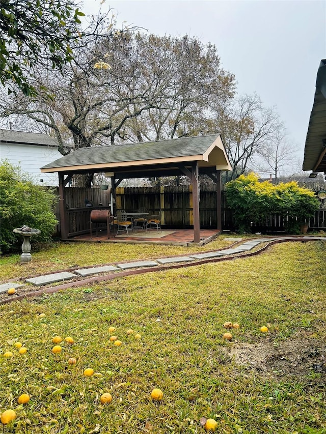 view of yard featuring a gazebo and a patio