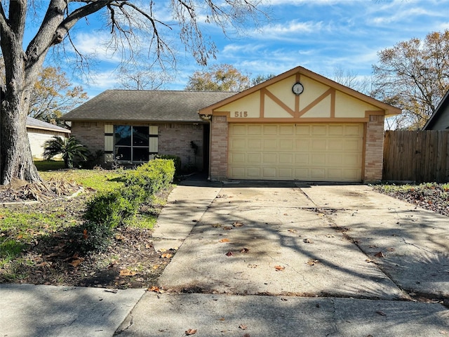 single story home featuring a garage