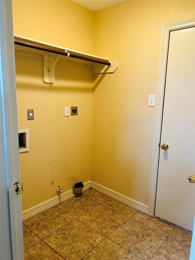 laundry room featuring hookup for a gas dryer, tile patterned flooring, washer hookup, and hookup for an electric dryer