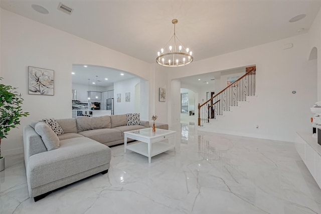 living room featuring an inviting chandelier