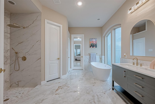 bathroom featuring vanity and plus walk in shower