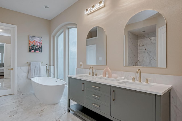 bathroom featuring vanity and plus walk in shower