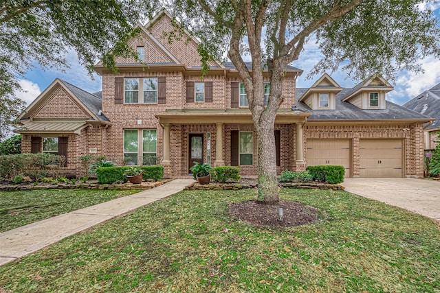 craftsman-style home with a garage and a front lawn