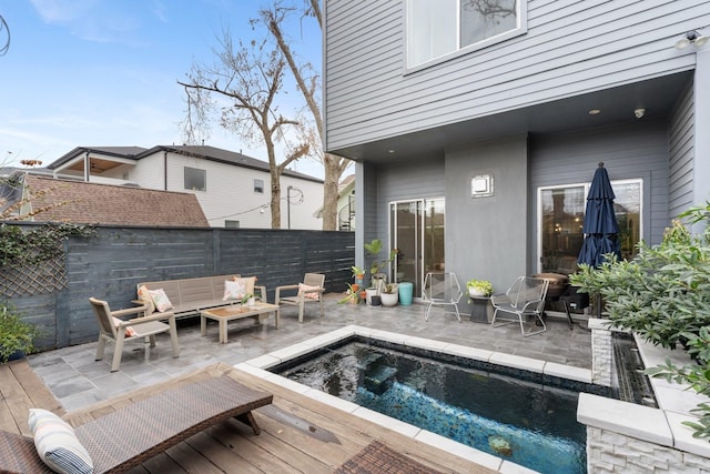 exterior space with a patio and outdoor lounge area