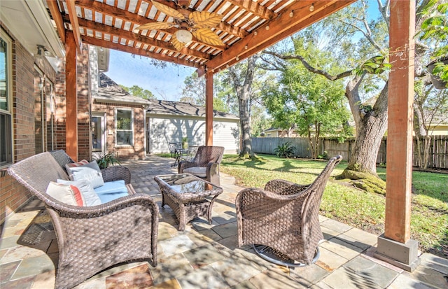 view of patio featuring ceiling fan, an outdoor hangout area, and a pergola