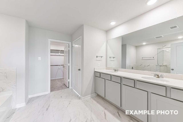 full bathroom with a stall shower, visible vents, a sink, marble finish floor, and a bath