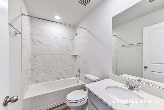 full bathroom with toilet, shower / tub combination, visible vents, and vanity