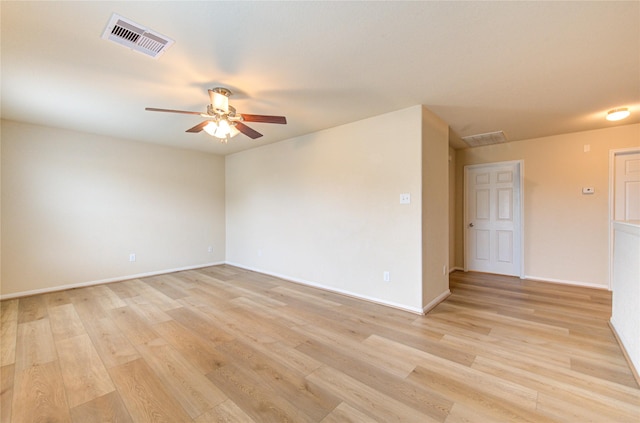 unfurnished room featuring ceiling fan and light hardwood / wood-style flooring