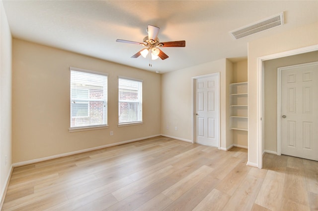 unfurnished bedroom featuring light hardwood / wood-style floors and ceiling fan