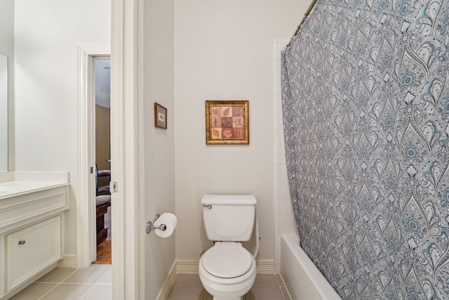 full bathroom with shower / bath combination with curtain, vanity, toilet, and tile patterned flooring