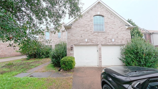 view of side of home featuring a garage