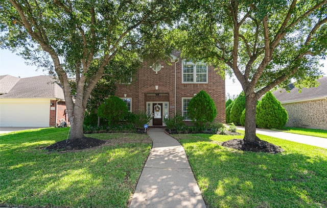 view of front facade with a front lawn