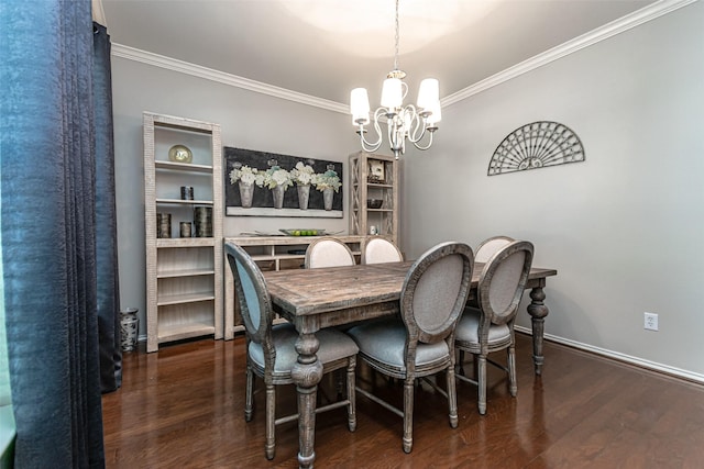 dining room with dark hardwood / wood-style flooring, ornamental molding, and a chandelier