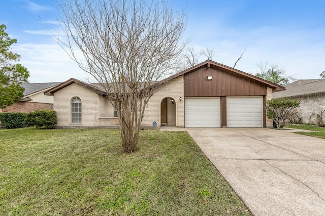 ranch-style house with a garage and a front lawn