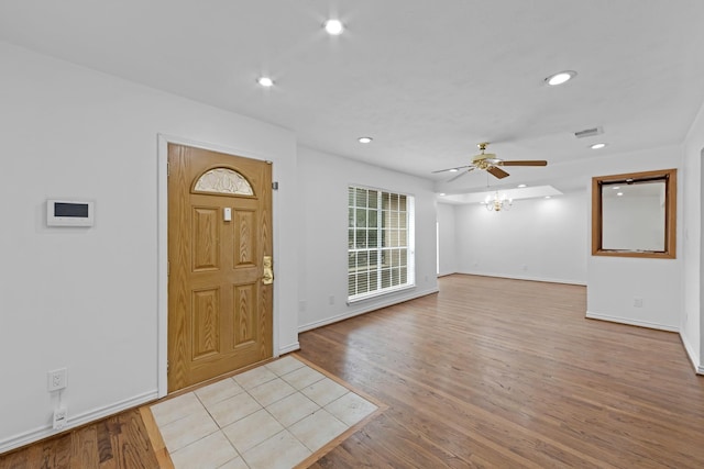 entryway featuring light hardwood / wood-style flooring and ceiling fan