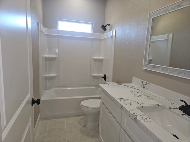 full bathroom featuring vanity, bathing tub / shower combination, and toilet