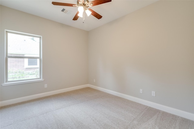 unfurnished room featuring carpet flooring and ceiling fan