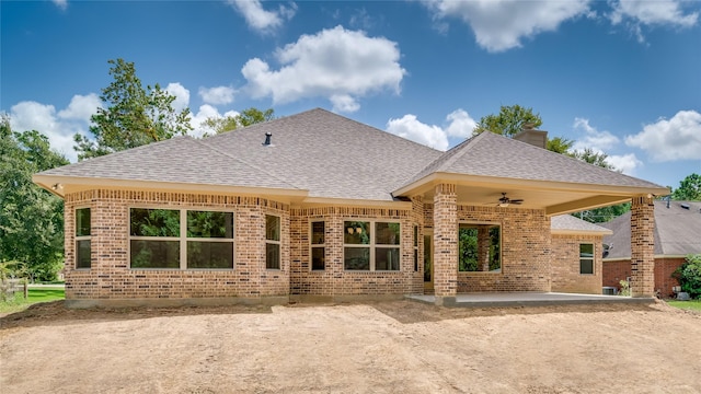 back of property featuring a patio and ceiling fan