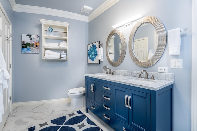 bathroom featuring vanity, ornamental molding, and toilet