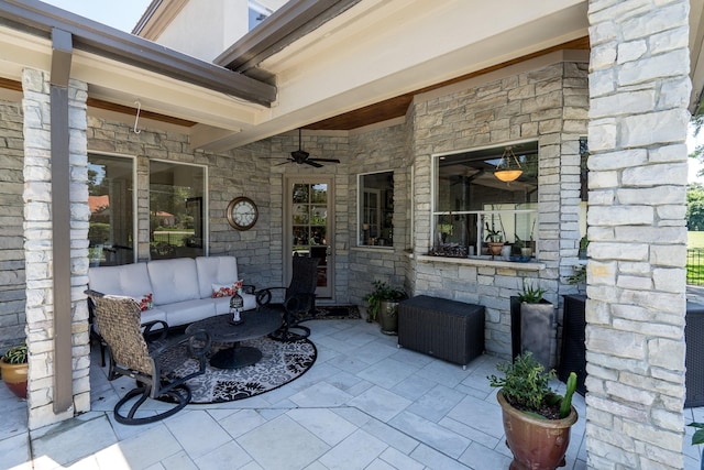 view of patio / terrace with ceiling fan and an outdoor hangout area