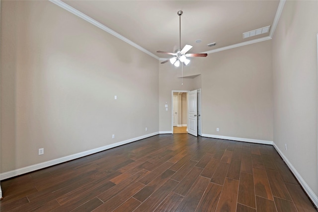 spare room featuring ornamental molding and ceiling fan