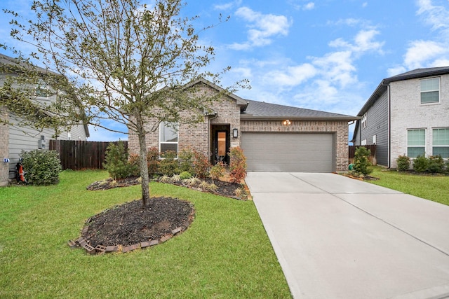 view of front facade with a garage and a front lawn