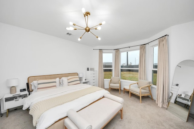 carpeted bedroom with multiple windows and an inviting chandelier