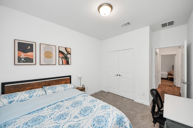 bedroom with carpet floors and a closet