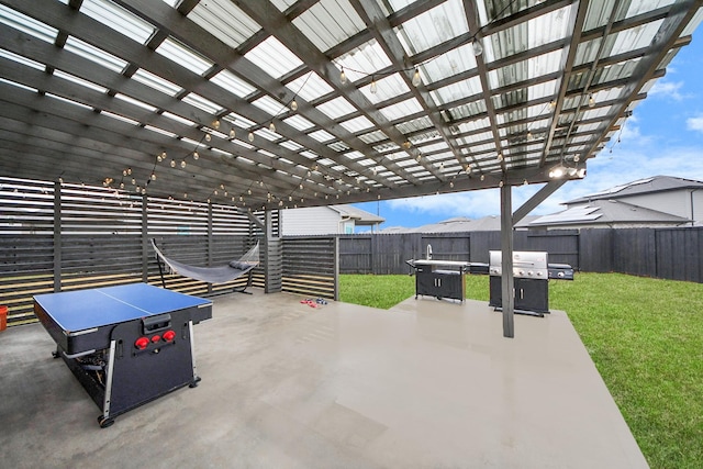 view of patio / terrace with a pergola and grilling area