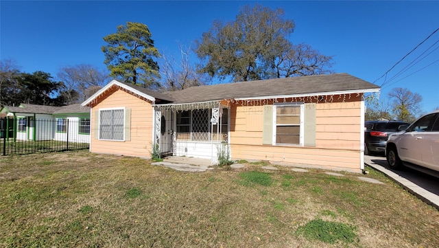 view of front of home with a front lawn