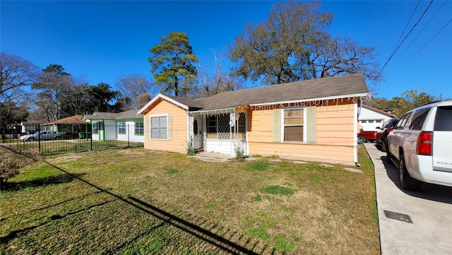 view of front of house with a front lawn