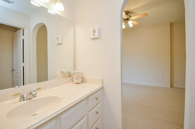 bathroom featuring vanity and ceiling fan