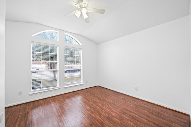 unfurnished room with vaulted ceiling, wood-type flooring, a healthy amount of sunlight, and ceiling fan