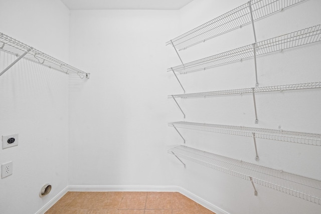 walk in closet featuring tile patterned floors