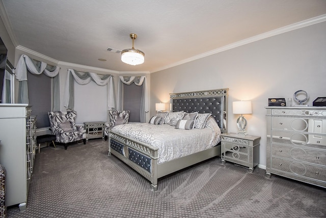 bedroom featuring ornamental molding and dark carpet