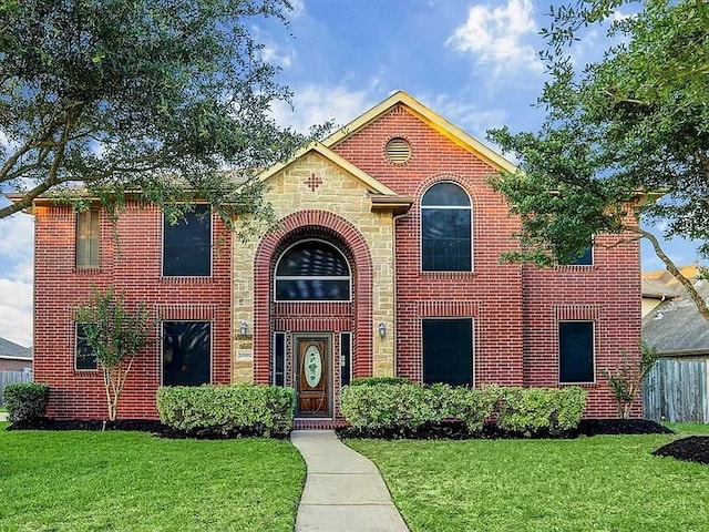 view of front of house with a front lawn