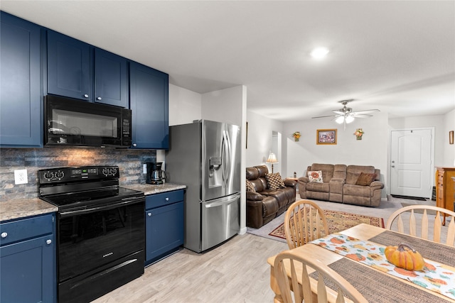 kitchen with blue cabinets, tasteful backsplash, light hardwood / wood-style flooring, ceiling fan, and black appliances