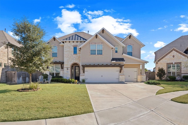 view of front of house featuring a garage and a front lawn