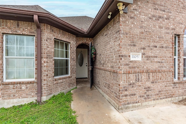 doorway to property with a patio area