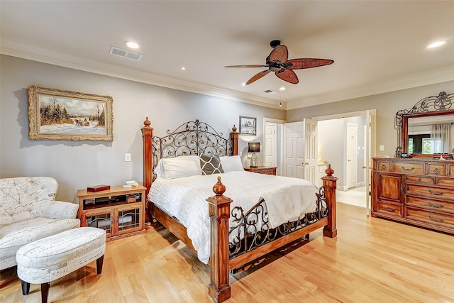 bedroom with ornamental molding, ceiling fan, and light hardwood / wood-style floors