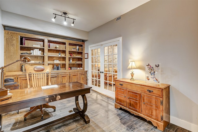 office space with dark hardwood / wood-style floors and french doors