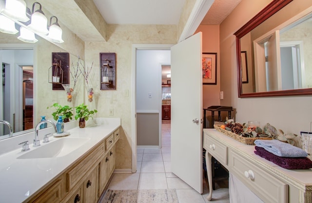 bathroom with vanity and tile patterned floors