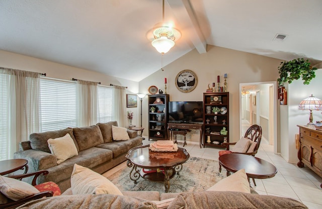 living area featuring light tile patterned flooring, visible vents, and vaulted ceiling with beams