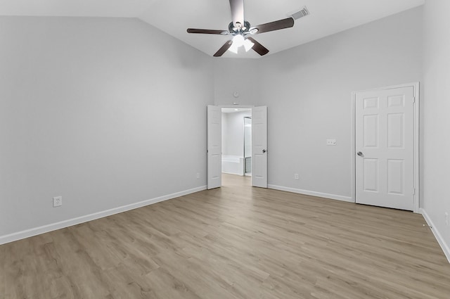 unfurnished bedroom featuring ceiling fan, high vaulted ceiling, and light hardwood / wood-style floors